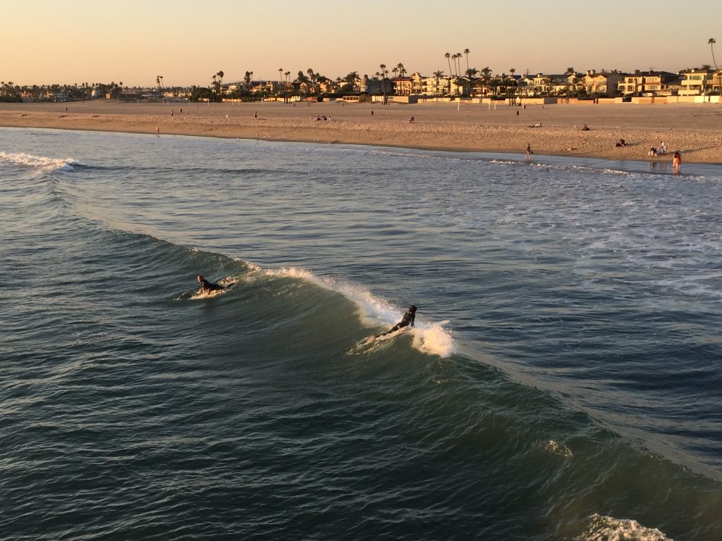 Surfers at Seal Beach, California